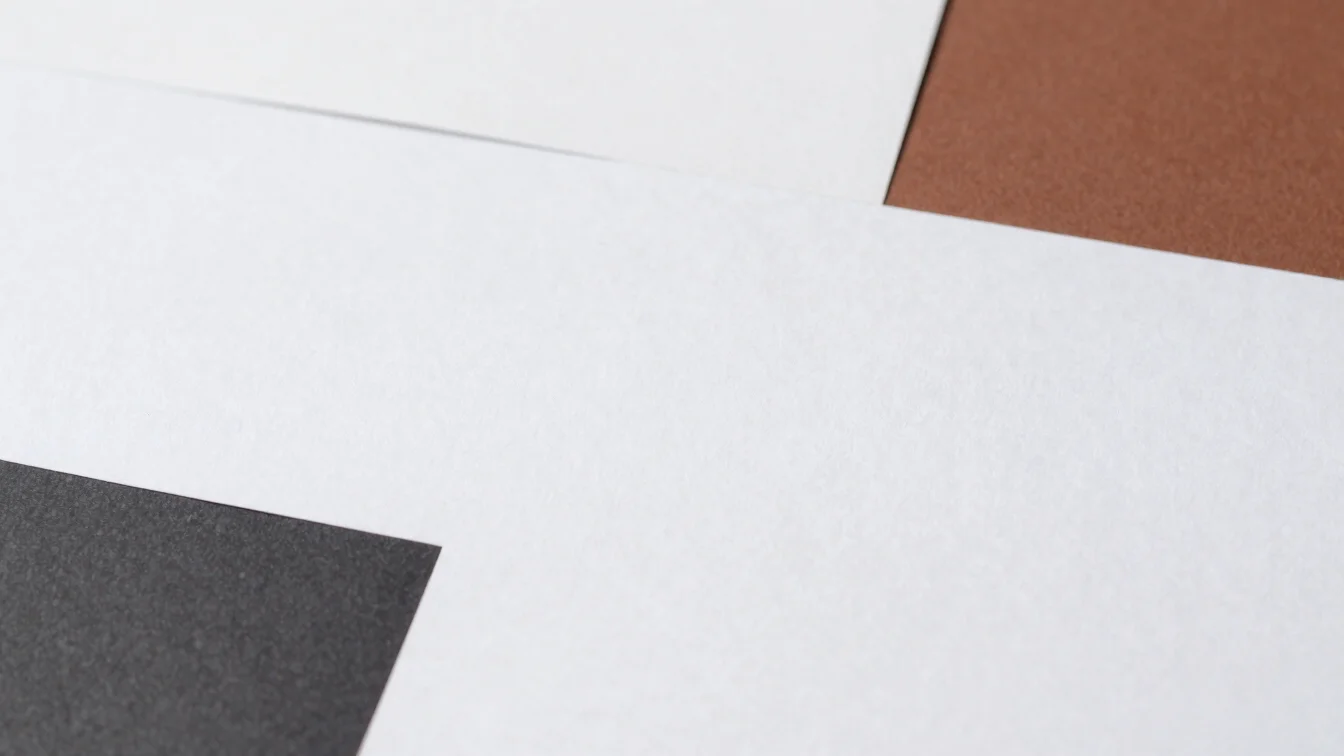 Close-up detail of high-end minimalist brand collateral studies o